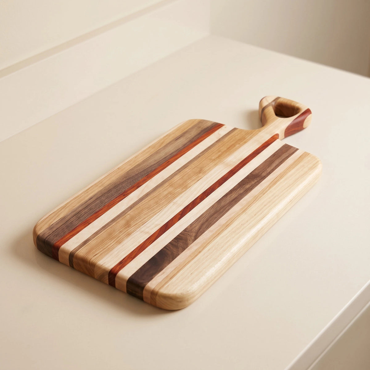 Edge grain charcuterie board made from mixed hardwoods, 16 by 7 inches